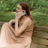 Etui UNIQ Coehl Terrazzo na iPhone 14 Pro - piaskowe